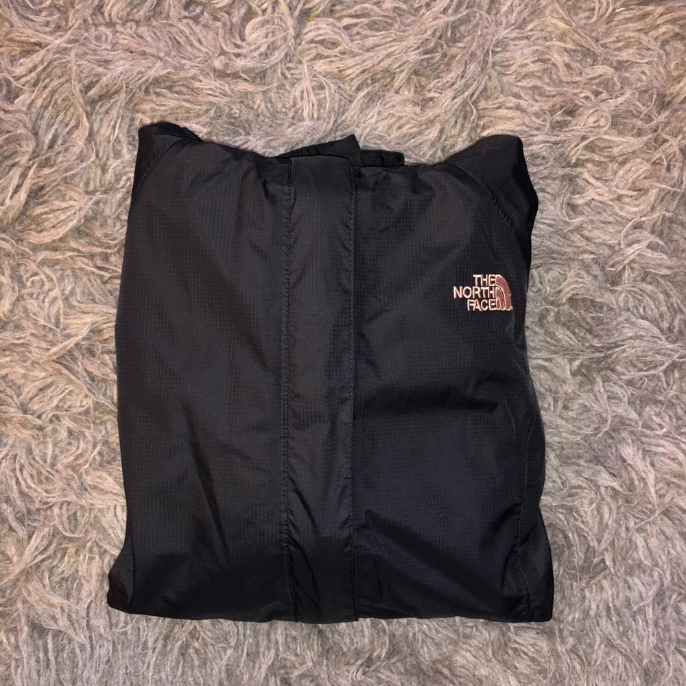 North Face rain jacket with pink logo